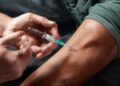 Men Inject Own Blood