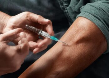 Men Inject Own Blood
