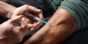 Men Inject Own Blood